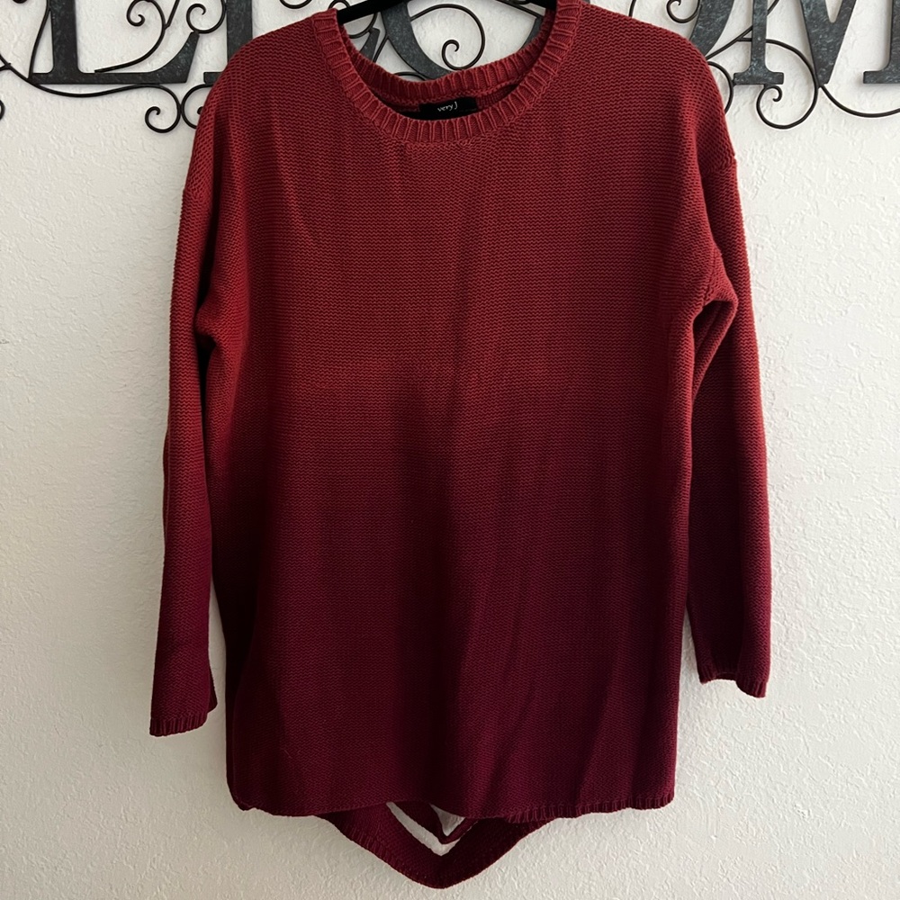 Cute long ombré sweater with an open back.